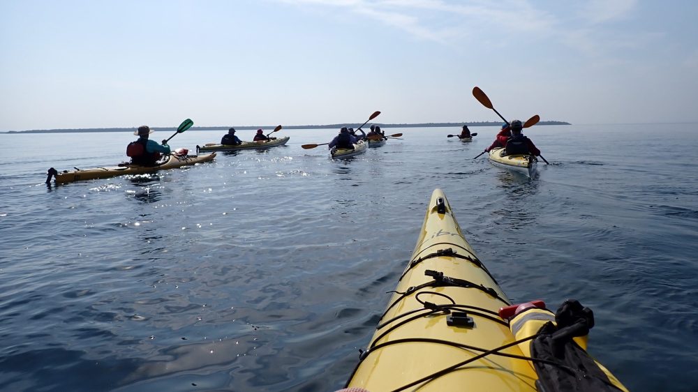 A group on a Wilderness Inquiry tripkayaking on Lake Superior